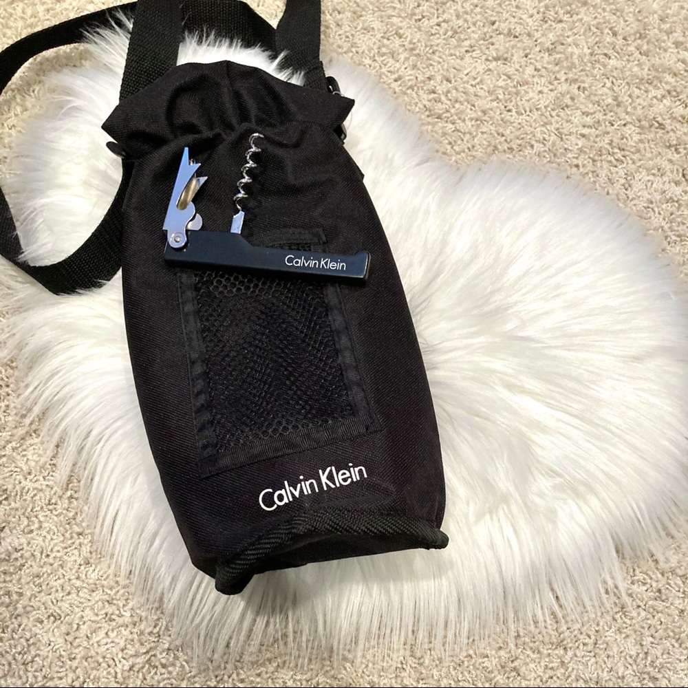 Calvin Klein wine bottle carrier and opener